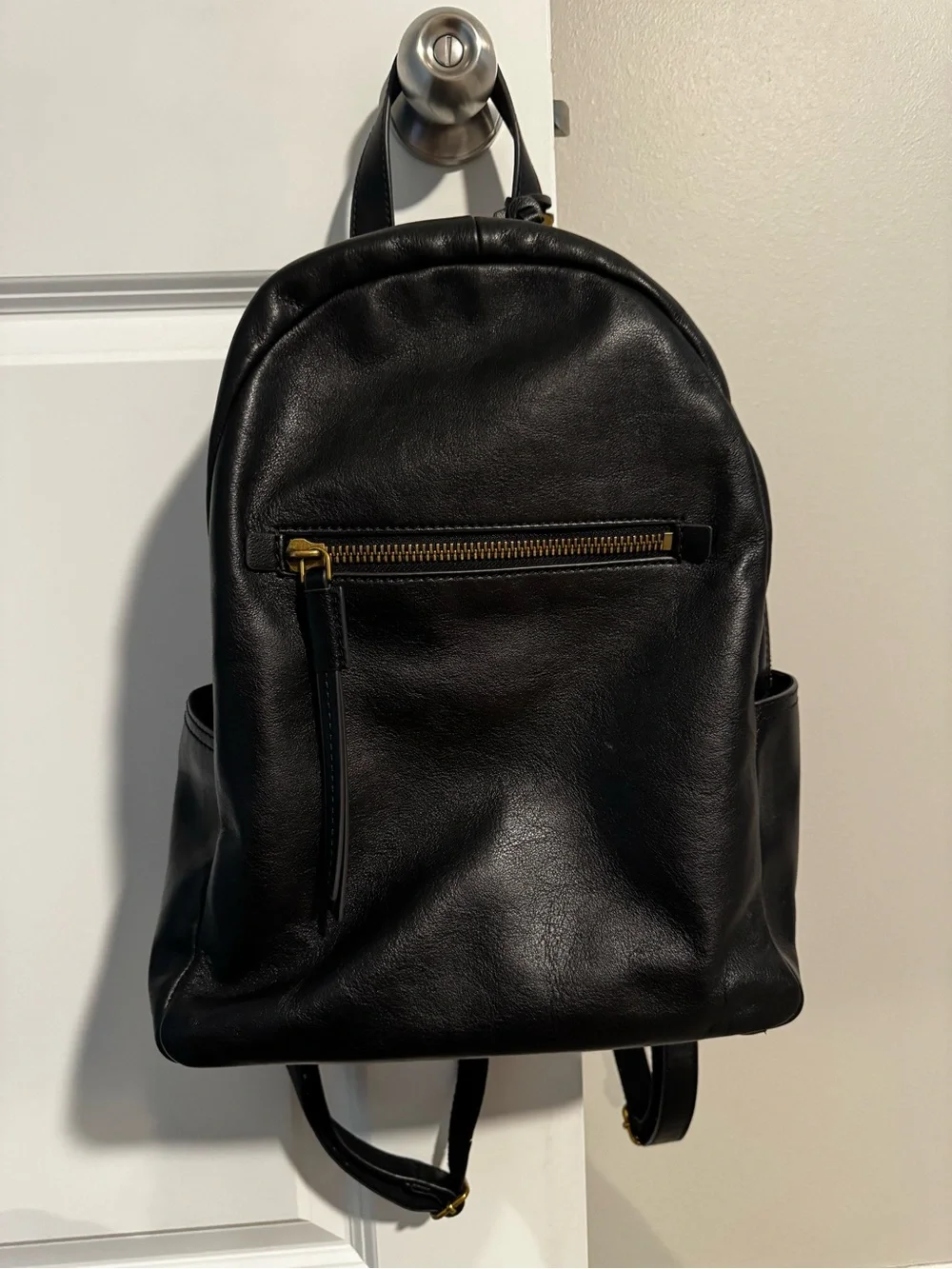 Fossil Black Leather Backpack with Gold Zip Accent